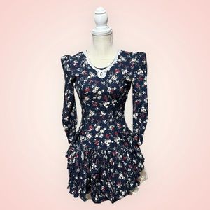 Vintage 80s floral mini dress with bows and peekaboo lace by Extra Femme